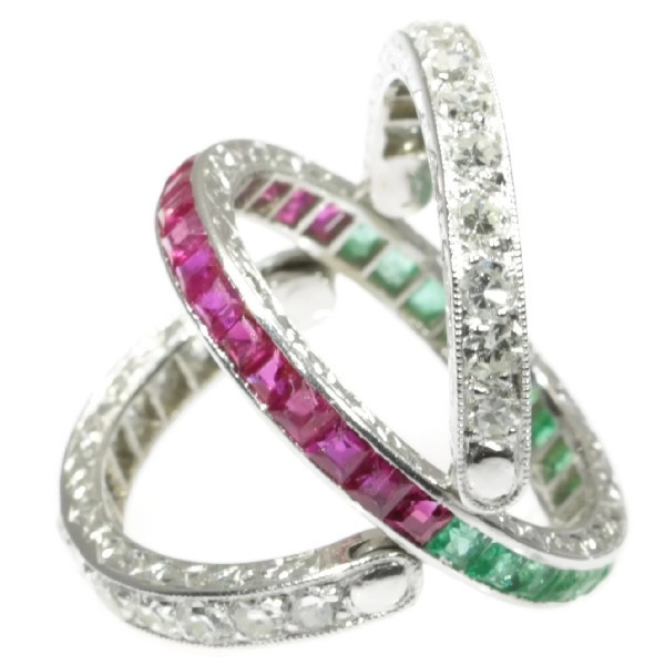 Magnificent eternity band with rubies and emeralds and hinged diamond parts